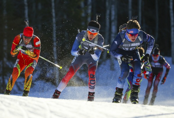 Zhenyu Zhu CHN (left) Woojin Wang KOR (centre) and Vaclav Cervenka USA (right) compete in the Biathlon Men's 10km Pursuit at Birkebeineren Biathlon Stadium during the Winter Youth Olympic Games, Lillehammer, Norway, 15 February 2016. Photo: Al Tielemans for YIS/IOC  Handout image supplied by YIS/IOC